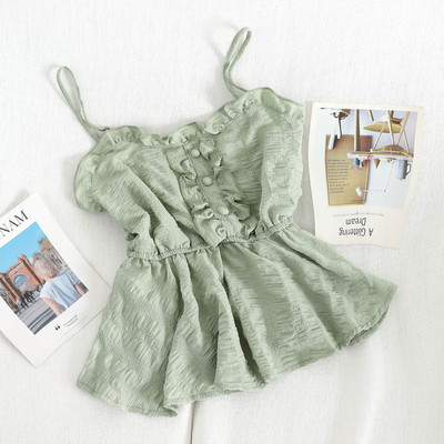 Modern női felső, vékony pántokkal és gombokkal, többféle színben