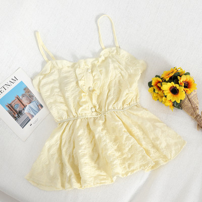 Modern női felső, vékony pántokkal és gombokkal, többféle színben