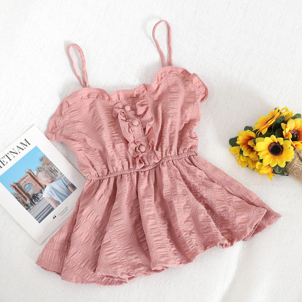 Modern női felső, vékony pántokkal és gombokkal, többféle színben