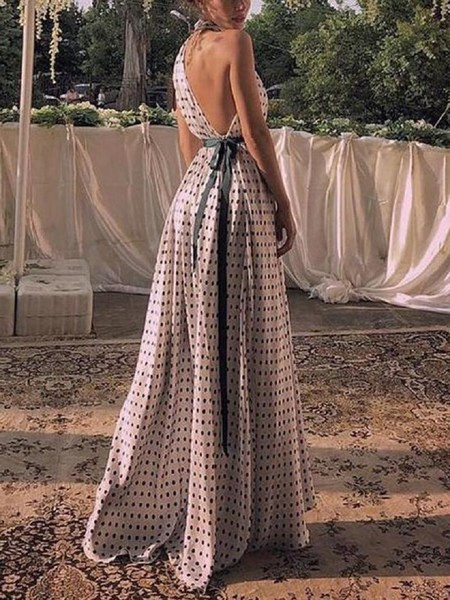 Stílusos aszimmetrikus női ruha fehér pöttyökkel