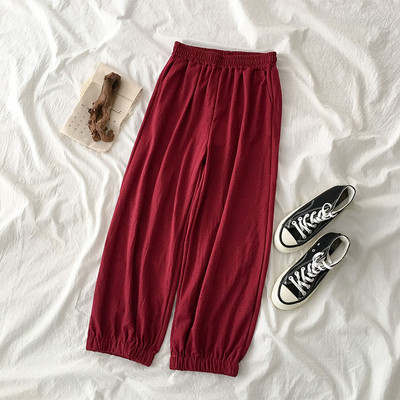 Női sportnadrág fekete szürke és bordó színben