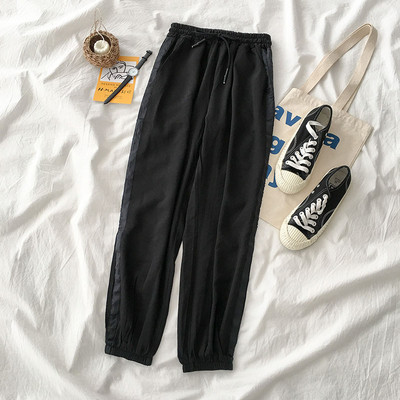 Női sportnadrág oldalsó szegéllyel, két színben