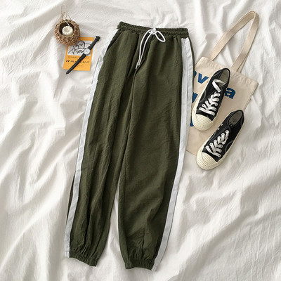 Női sportnadrág oldalsó szegéllyel, két színben