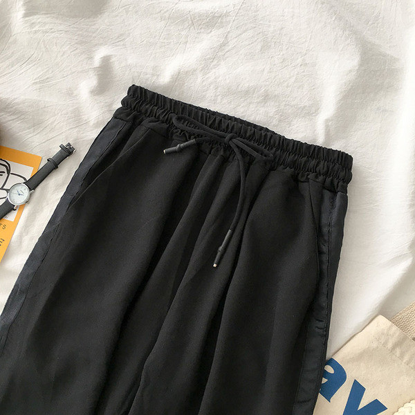 Női sportnadrág oldalsó szegéllyel, két színben