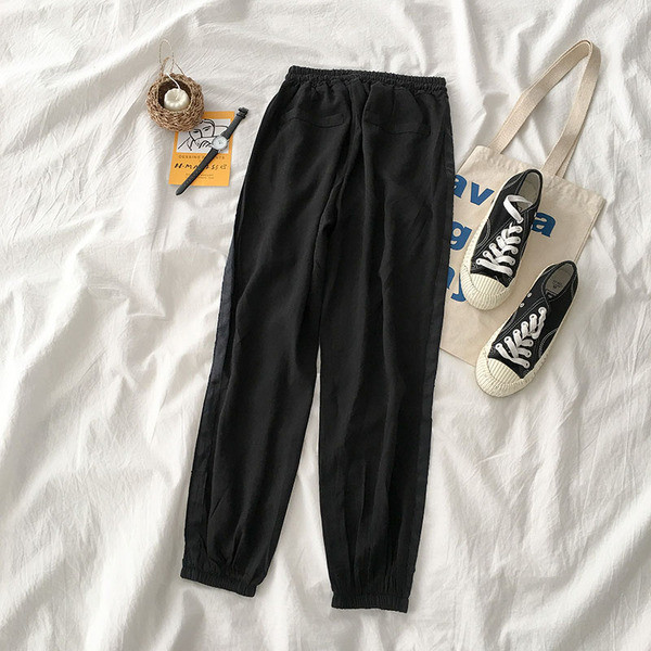 Női sportnadrág oldalsó szegéllyel, két színben