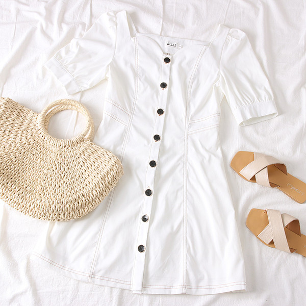 Modern női ruha 3/4-es ujjal és gombokkal fehér és sárga színben