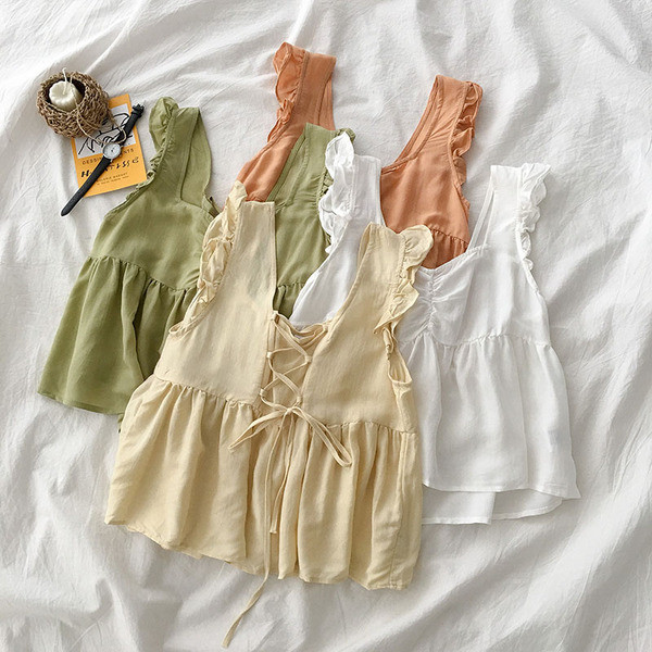 Rövid, hátul megkötős felső négy színben