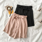 Alkalmi női nadrág magas derékkal és nyakkendővel