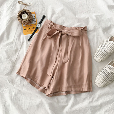 Alkalmi női nadrág magas derékkal és nyakkendővel