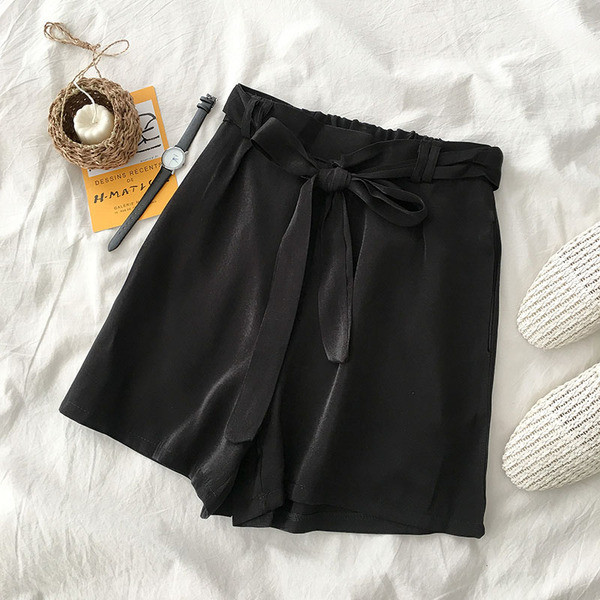 Alkalmi női nadrág magas derékkal és nyakkendővel