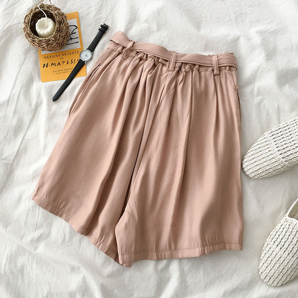 Alkalmi női nadrág magas derékkal és nyakkendővel
