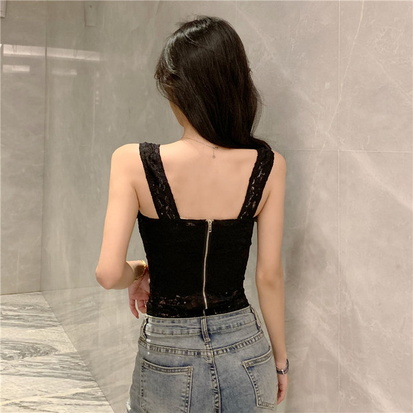 Női felső csipkepánttal és cipzárral