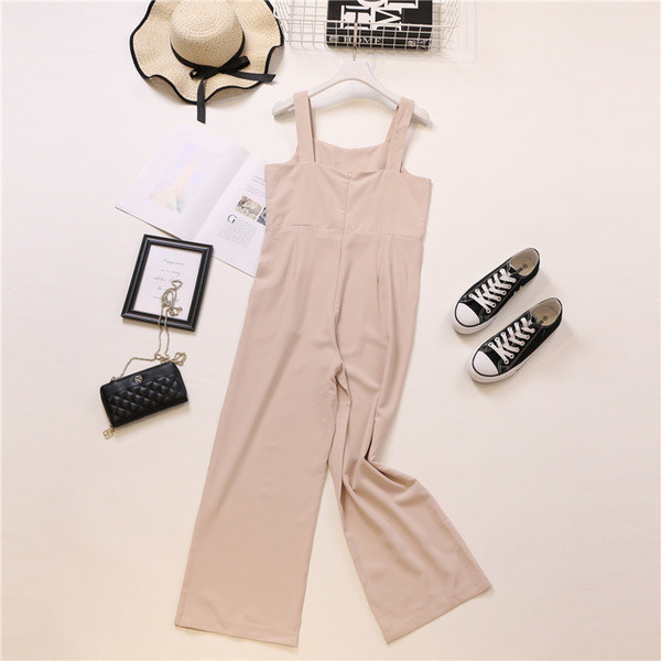 Modern női overál rózsaszín és fekete pántokkal