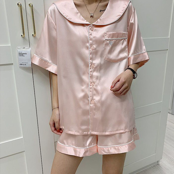 Kétrészes női pizsama fehér és rózsaszín színben