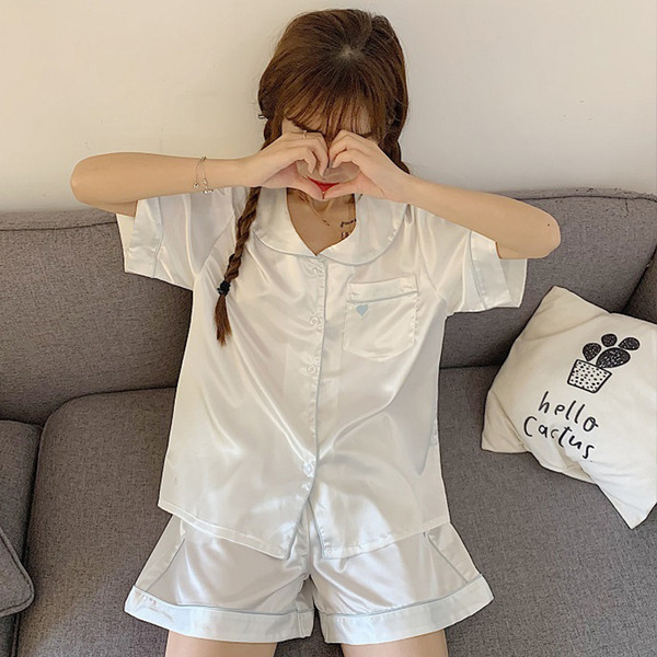 Kétrészes női pizsama fehér és rózsaszín színben