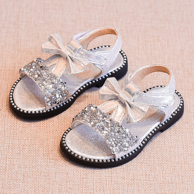 Gyerekszandál lányoknak három színben kövekkel és szalaggal