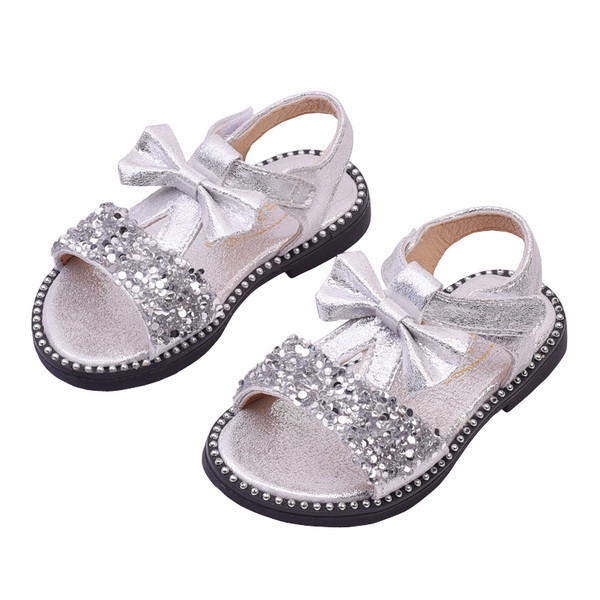 Gyerekszandál lányoknak három színben kövekkel és szalaggal