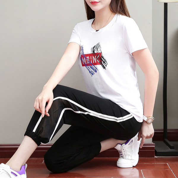 Női alkalmi blúz szett rövid ujjal és nadrággal