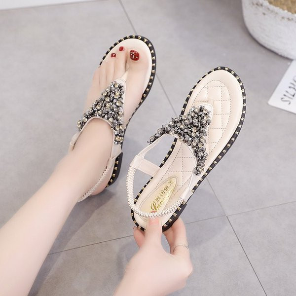 Alkalmi női szandál kövekkel fehér és fekete színben
