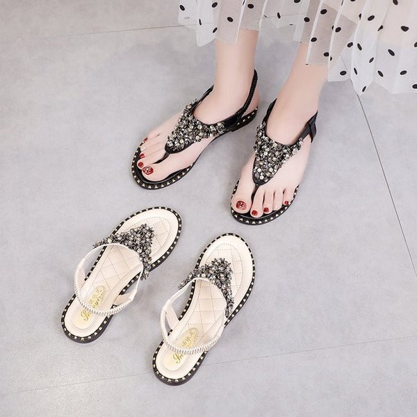 Alkalmi női szandál kövekkel fehér és fekete színben