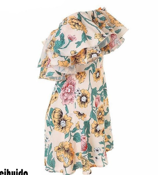 Nyári női overál csupasz vállval, virágmintával