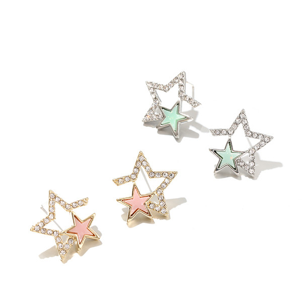 Cercei de dama actuali in doua culori cu pietre decorative