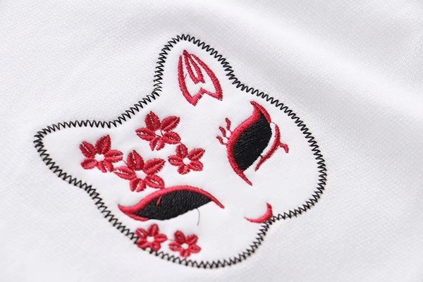 Μοντέρνο γυναικείο μπλουζάκι με εφαρμογές και κορδόνια  σε δύο χρώματα