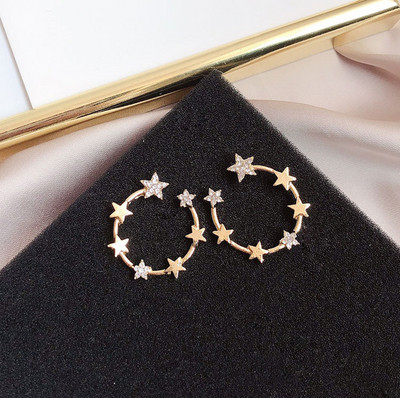 Нов модел дамски обеци в златист цвят с камъни