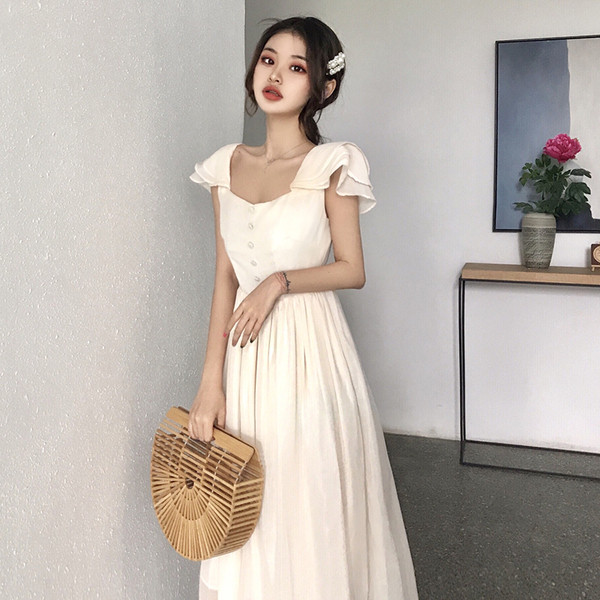 Дамска лятна разкроена рокля с къс ръкав и копчета