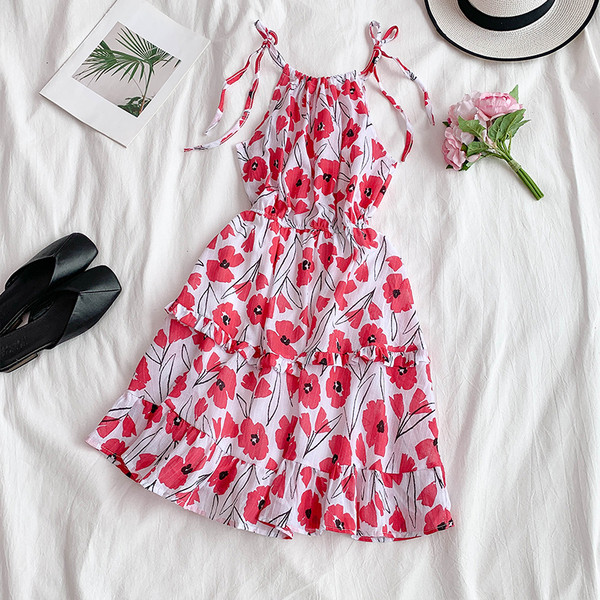 Цветна дамска рокля разкроен модел с флорален десен 