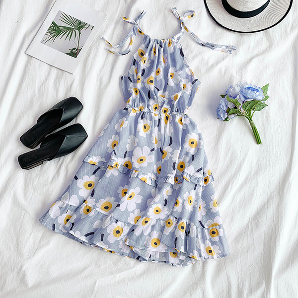 Цветна дамска рокля разкроен модел с флорален десен 