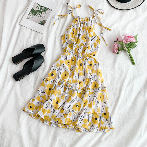 Цветна дамска рокля разкроен модел с флорален десен 