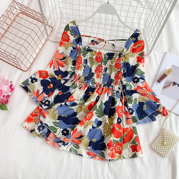 Дамска рокля разкроен модел с флорален десен 