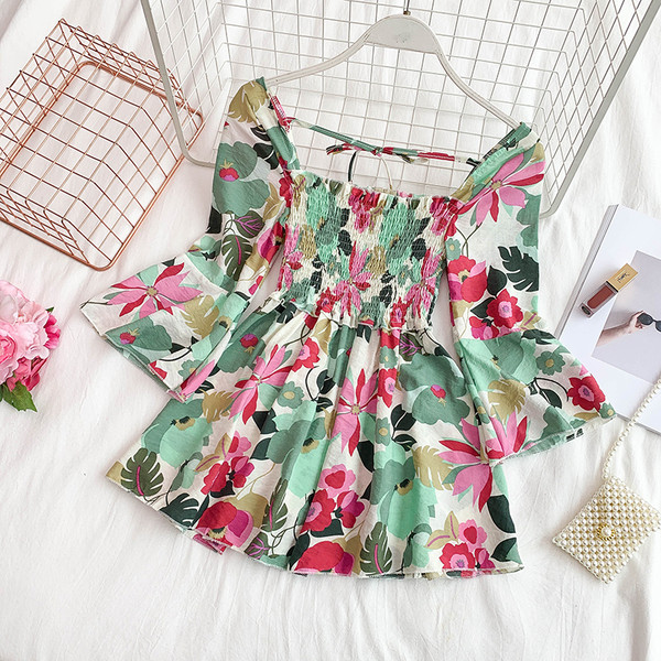 Дамска рокля разкроен модел с флорален десен 