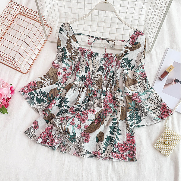 Дамска рокля разкроен модел с флорален десен 