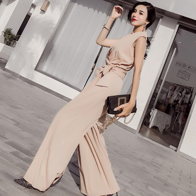 Elegáns női jumpsuit V-nyakkal és megkötővel piros, bézs és fekete színben