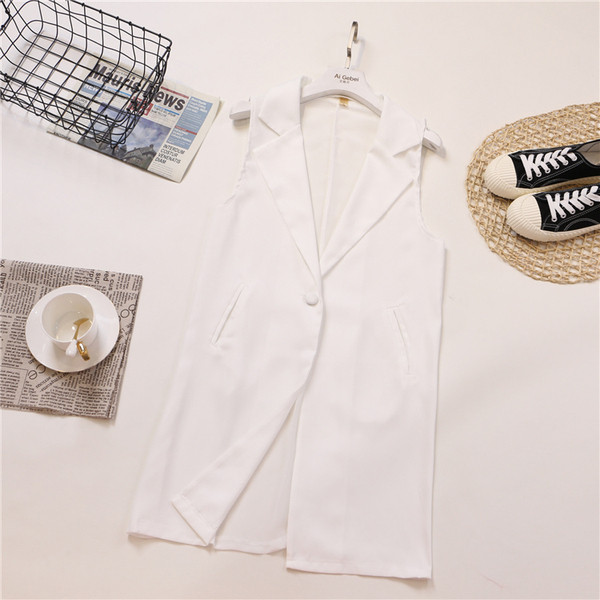 Модерно дамско сако без ръкави в бял и черен цвят