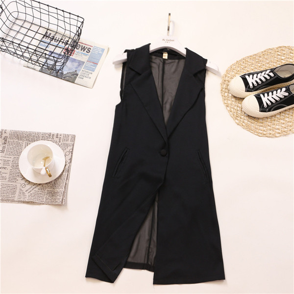 Модерно дамско сако без ръкави в бял и черен цвят