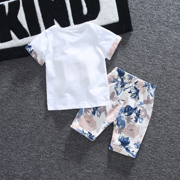 Детски комплект в два цвята с флорални мотиви-за момчета