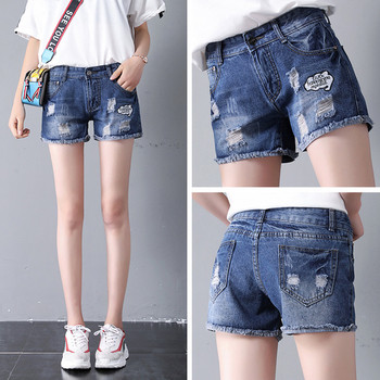 Casual  γυναικεία shorts τζιν  με κεντήματα και σχισμένα μοτίβα σε γαλάζιο χρώμα