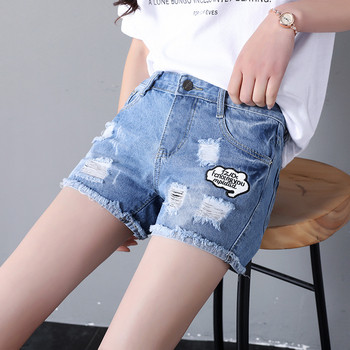 Casual  γυναικεία shorts τζιν  με κεντήματα και σχισμένα μοτίβα σε γαλάζιο χρώμα