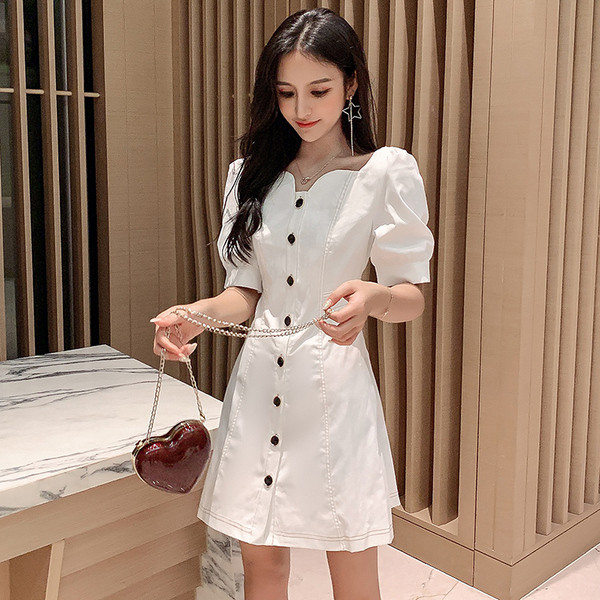 Rochie elegantă de damă cu mâneci 3/4 în alb