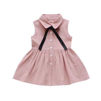Модерна детска рокля в розов цвят с копчета и панделка