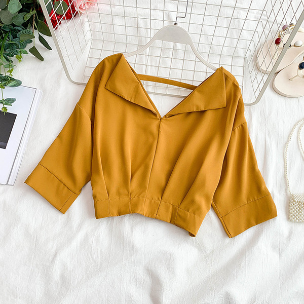 Modern női rövid blúz V-nyakkal, több színben