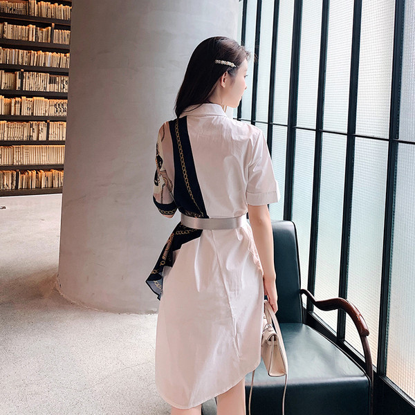 Stílusos női ruha 3/4-es ujjal és övvel