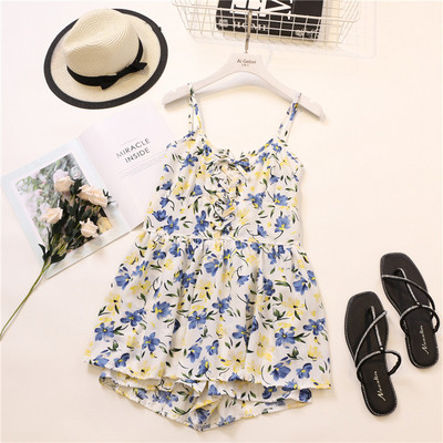 Alkalmi női overál virágos motívumokkal és pántokkal