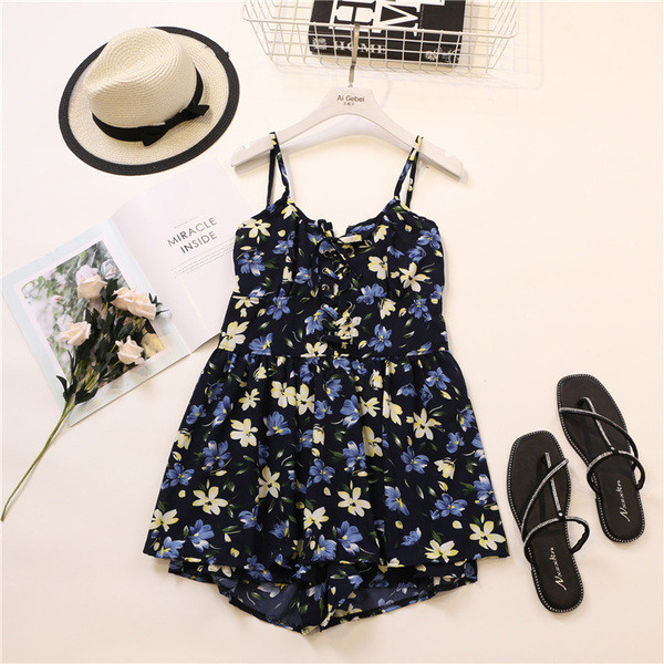 Alkalmi női overál virágos motívumokkal és pántokkal