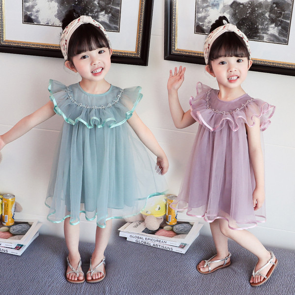 Gyermek modern ruha szabású modell három színben, tüllel