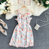 Modern női ruha cipzárral és virágmotívummal