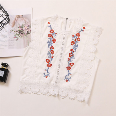 Stílusos női felső csipkével és virágmotívummal, fehér és fekete színben